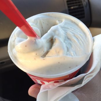 Dairy Queen Store - a hand holding a cup of ice cream - Ice Cream & Frozen Yogurt Near Me - Batavia, Illinois Dairy Queen Store - a hand holding a cup of ice cream - Ice Cream & Frozen Yogurt Near Me - Batavia, Illinois