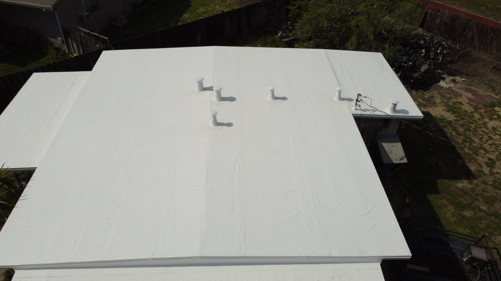 Slide of Econo Roofing