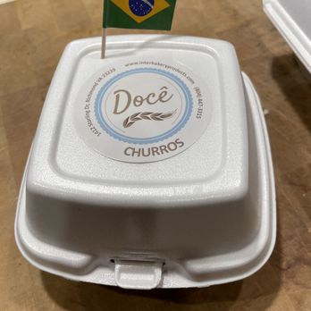Doce Churros - Little  Brazilian flag with the takeout order - Bakeries Near Me - Richmond, Virginia