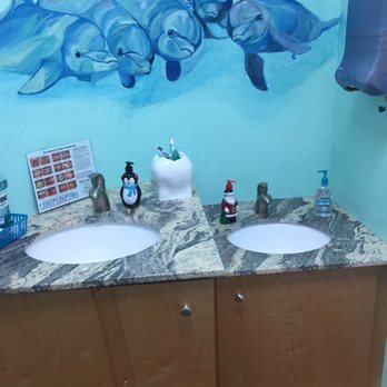 Little Smiles Dental - child sized sinks with playful dolphins watching over! - Pediatric Dentists Near Me - Boynton Beach, Florida Little Smiles Dental - child sized sinks with playful dolphins watching over! - Pediatric Dentists Near Me - Boynton Beach, Florida