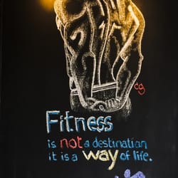 Anytime Fitness - One of our wonderful trainers, Carey, is also a talented artist and hit the ball out of the park on our entranceway chalkboard