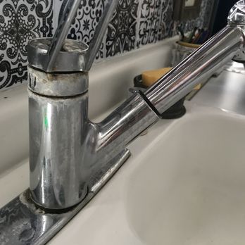 Elite Plumbing Services - My gross old kitchen faucet. Old and apparently leaky. Little tiny drips that rusted the nut to the bolt. - Plumbing Near Me - Cotati, California