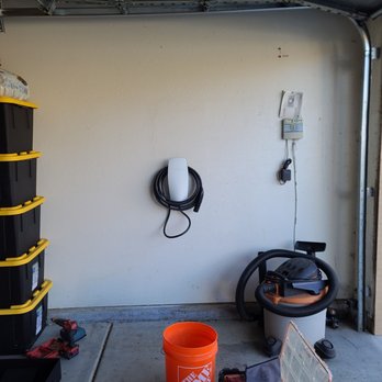 New Phase Electric - Tesla Wall Charger Installed - Electricians Near Me