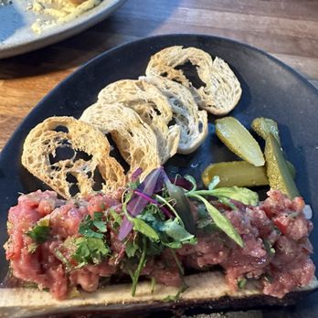 Roja Los Altos - Steak tartare on a bone marrow was good - Modern European Near Me - Los Altos, California Roja Los Altos - Steak tartare on a bone marrow was good - Modern European Near Me - Los Altos, California