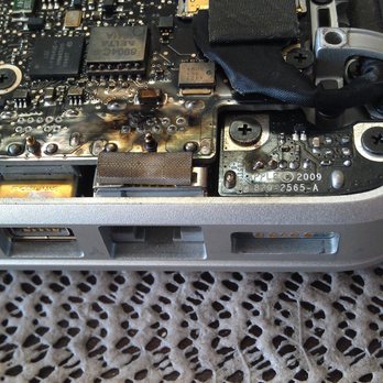 Computer Services Unlimited - Macbook With Burnt Circuit Board on Ethernet Jack - IT Services & Computer Repair Near Me - Escondido, California