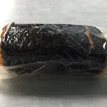 Red Rice - Red rice musubi with pickled daikon. - Barbeque Near Me - Las Vegas, Nevada