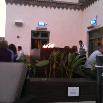 Ibiza - Rooftop seating outside with open fireplace. - Lounges Near Me - Albuquerque, New Mexico