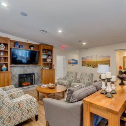 Vista Living Senior Care - Camelback - The living room with fireplace and tv