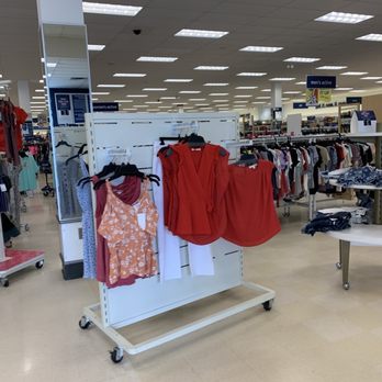 Marshalls - Shirts randomly placed in the middle of the floor on a rolling display cart. - Department Stores Near Me - Concord, North Carolina
