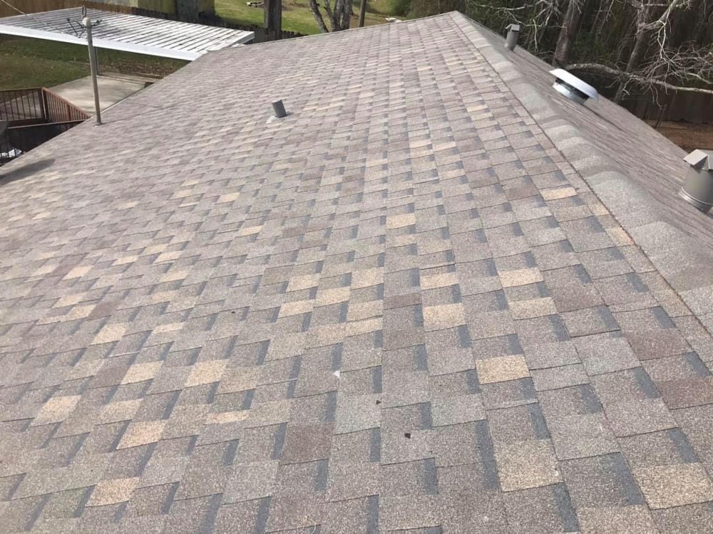 Slide of Arcon Roofing Construction