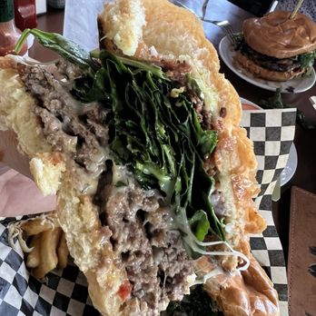Brahma Bar and Grill - The Peach Pit cross section of goodness. The cheese, the patty, the greens. So good. - New American Near Me - Fair Oaks, California