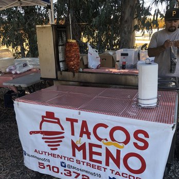 Taquizas el Meño - a man standing at a table with a glass of milk - Street Vendors Near Me - Hayward, California Taquizas el Meño - a man standing at a table with a glass of milk - Street Vendors Near Me - Hayward, California