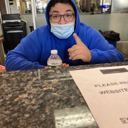 Synergy Fitness - Staff member not wearing mask over his nose
