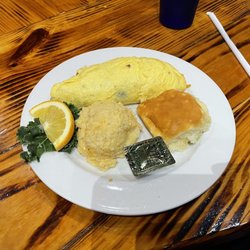 Josie's - Josie's Dad's omelette with the house made cheese grits casserole.