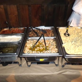 Pastanza Catering - Outstanding Pasta Bar Concept - choose your ingredients, meats here: chicken, sausage, beef - Caterers Near Me