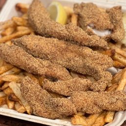 Fried Catfish w/ Cajun Fries. Fried Catfish w/ Cajun Fries.