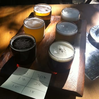 Vices et Versa - Various white, blonde and amber beers. The #'s are associated with the name & number listing on the chalk board! - Poutineries Near Me - Montreal, Quebec