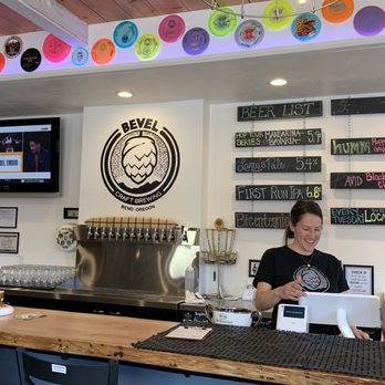 Bevel Craft Brewing - The bar...check out the frisbees. - Breweries Near Me - Bend, Oregon