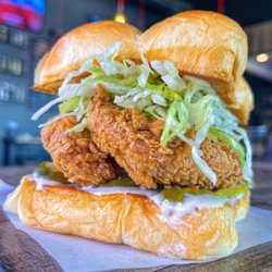 Dog Haus - BAD MUTHA CLUCKA - two crispy fried chicken tenders, miso ranch, dill pickle slices, lettuce