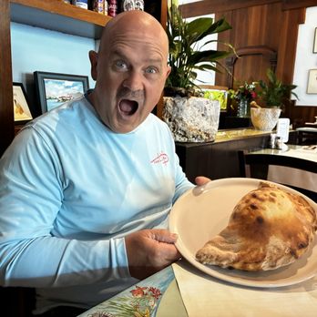 La Rosa dei Venti - Holy Calzonie! That's a huge calzone! - Italian Near Me - Stresa, VB La Rosa dei Venti - Holy Calzonie! That's a huge calzone! - Italian Near Me - Stresa, VB