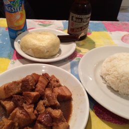 Pork adobo, steamed rice and Siopao