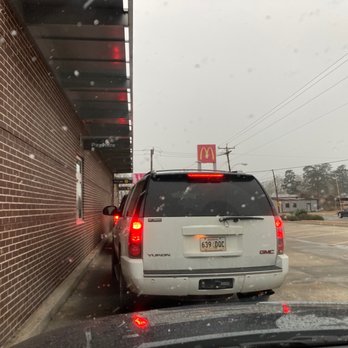 McDonald's - a white suv stopped at a red light - Fast Food Near Me - Mansfield, Louisiana