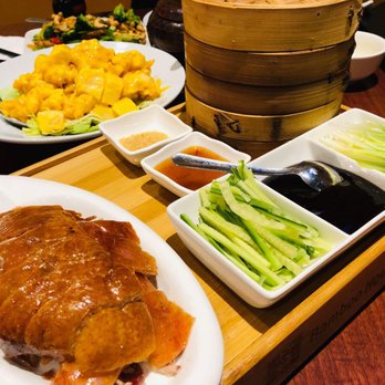 Bamboo House - Peking duck not in the bun but the rolls!! Cones in 2 part so you can enjoy it hot and crispy! - Noodles Near Me - Humble, Texas