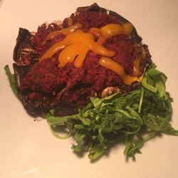 One 11 Kitchen & Bar - Portobello with small amount of cheese, broken shroom rotten arugula-- supposed to be gratin?