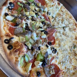 Village and clam split pizza