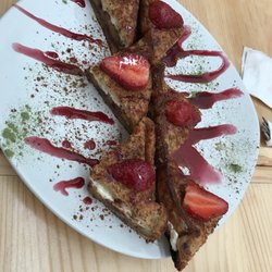 Nativo - Delicious French toast filled with fried plantains, Nutella and cream cheese.