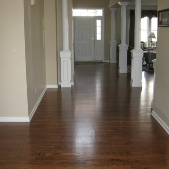 Payless Carpet - an empty hallway with wood floors - Carpet Installation Near Me - Garden City, Michigan Payless Carpet - an empty hallway with wood floors - Carpet Installation Near Me - Garden City, Michigan