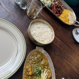 Palak Paneer, rice, and beef lunch special pictured. Delicious and authentic Indian cuisine. Palak Paneer, rice, and beef lunch special pictured. Delicious and authentic Indian cuisine.