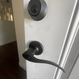 Replaced door knob and fixed door hinges