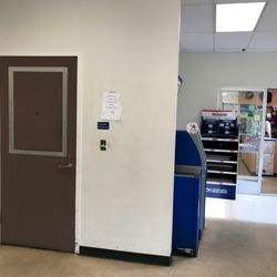 US Post Office - THE door. If you have mail to pick up, come to the door, push and hold down the bell for 3 seconds for service.
