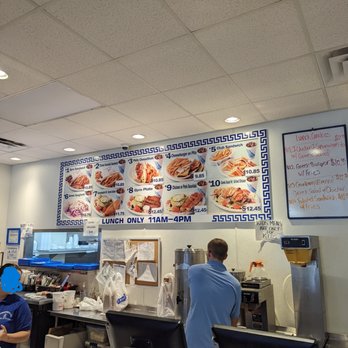 Mykonos Grill - a man working at the counter - Greek Near Me - Salisbury, North Carolina