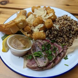 Seared tuna with truffle parm totts and ancient grains.