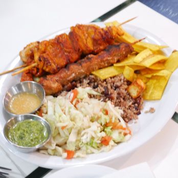Nica Lounge - a plate of food on a table - Lounges Near Me - Concord, California