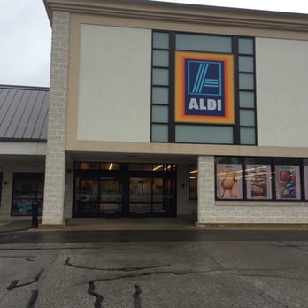 ALDI - a woman walking in front of a store - Grocery Near Me - Ridgeville, Ohio ALDI - a woman walking in front of a store - Grocery Near Me - Ridgeville, Ohio