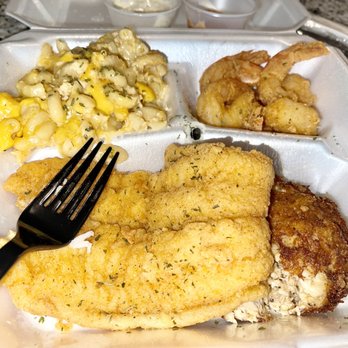 Soulific Seafood - a plate of food and a fork - Seafood Near Me Soulific Seafood - a plate of food and a fork - Seafood Near Me