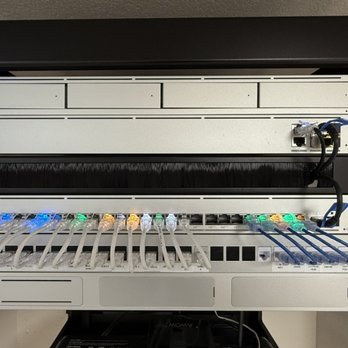 Wire Genie - A beautiful closeup of a network rack face. - Home Theatre Installation Near Me Wire Genie - A beautiful closeup of a network rack face. - Home Theatre Installation Near Me