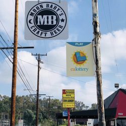 Moon Baby’s Liquor - New sign