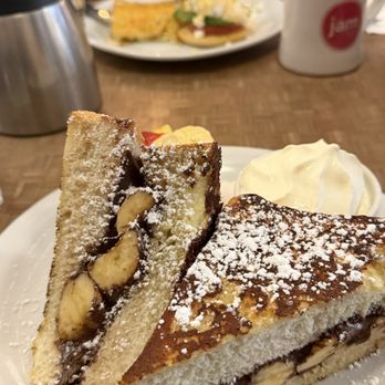 Jam Cafe - Cracker Jack French Toast (banana and Nutella stuffed French toast) - Breakfast & Brunch Near Me - Victoria, British Columbia Jam Cafe - Cracker Jack French Toast (banana and Nutella stuffed French toast) - Breakfast & Brunch Near Me - Victoria, British Columbia