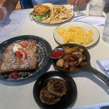 Curfew - French toast, turkey sausage, eggs, and home fries. Chicken sandwich with fries - New American Near Me - Memphis, Tennessee
