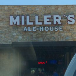 Exterior outside entrance of Miller's Ale House - Doors open to the bar. Plenty of TV's for watching sports. - Kennesaw, Georgia Exterior outside entrance of Miller's Ale House - Doors open to the bar. Plenty of TV's for watching sports. - Kennesaw, Georgia