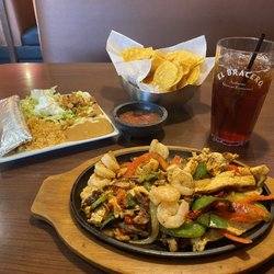 El Bracero Clarksville - Fajitas, Jalisco. Shrimp, beef, and chicken. Comes with tortilla salad, refried beans, rice and salsa.
