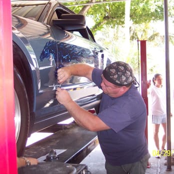 Formula One - Owner, LARRY, puts a custom horse logo on a new Mustang! - Auto Customization Near Me - Vero Beach, Florida