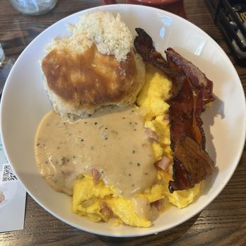 Another Broken Egg Cafe - Power Bowl with bacon, biscuit, gravy, ham, eggs, cheese grits!! This will definitely be two or three meals for me! - Breakfast & Brunch Near Me - Lexington, South Carolina Another Broken Egg Cafe - Power Bowl with bacon, biscuit, gravy, ham, eggs, cheese grits!! This will definitely be two or three meals for me! - Breakfast & Brunch Near Me - Lexington, South Carolina