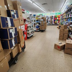 Dollar Tree - Stock boxes in the aisles