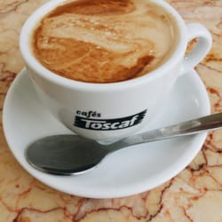 La Oca Panaderia - Café con leche. (Remember if you want here is "sacarina" for splenda.