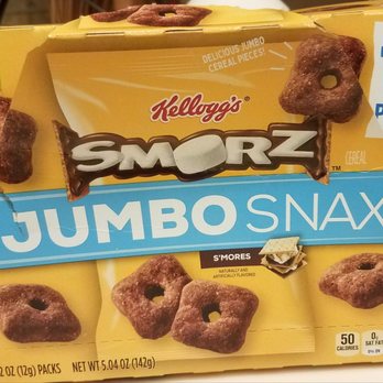 Ollie's Bargain Outlet - 12 pack for just $2.49 - A Kellogg's Smorz Jumbo Snax cereal snack box displays 12 individual packs, with images of square, s'mores-flavored cereal pieces on the front. The packaging is primarily yellow and blue, highlighting the product's size and flavor. The box emphasizes the cereal's texture and flavor, with nutritional information and branding visible. - Discount Store Near Me - Barkhamsted, Connecticut